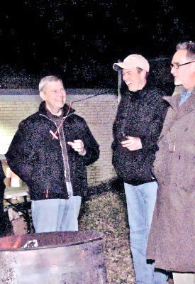 Cary with Randy Moore and Frank Messer warmed by the reception of the park plan and bonfire at the presentation of the Roanoke Park Plan. [br]-December 2, 2010. Westport Roanoke Community Center